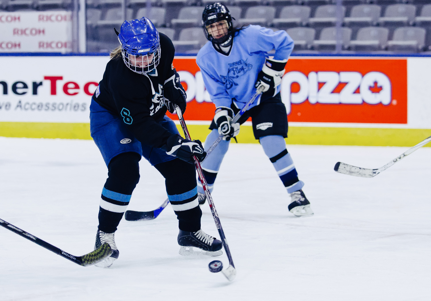 Hockey player shooting the puck during a recreational game